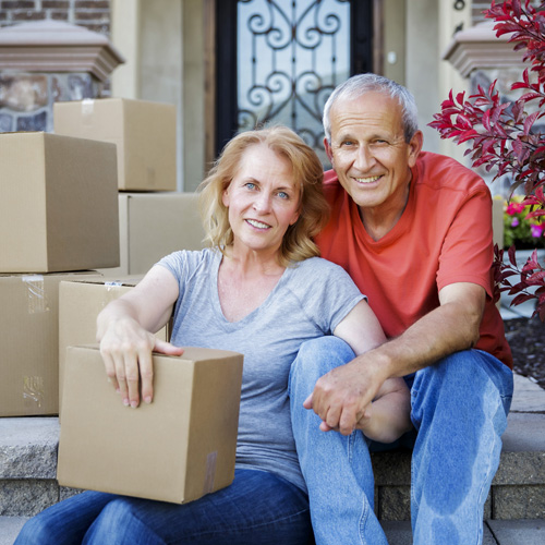 Mature Couple with Moving Boxes