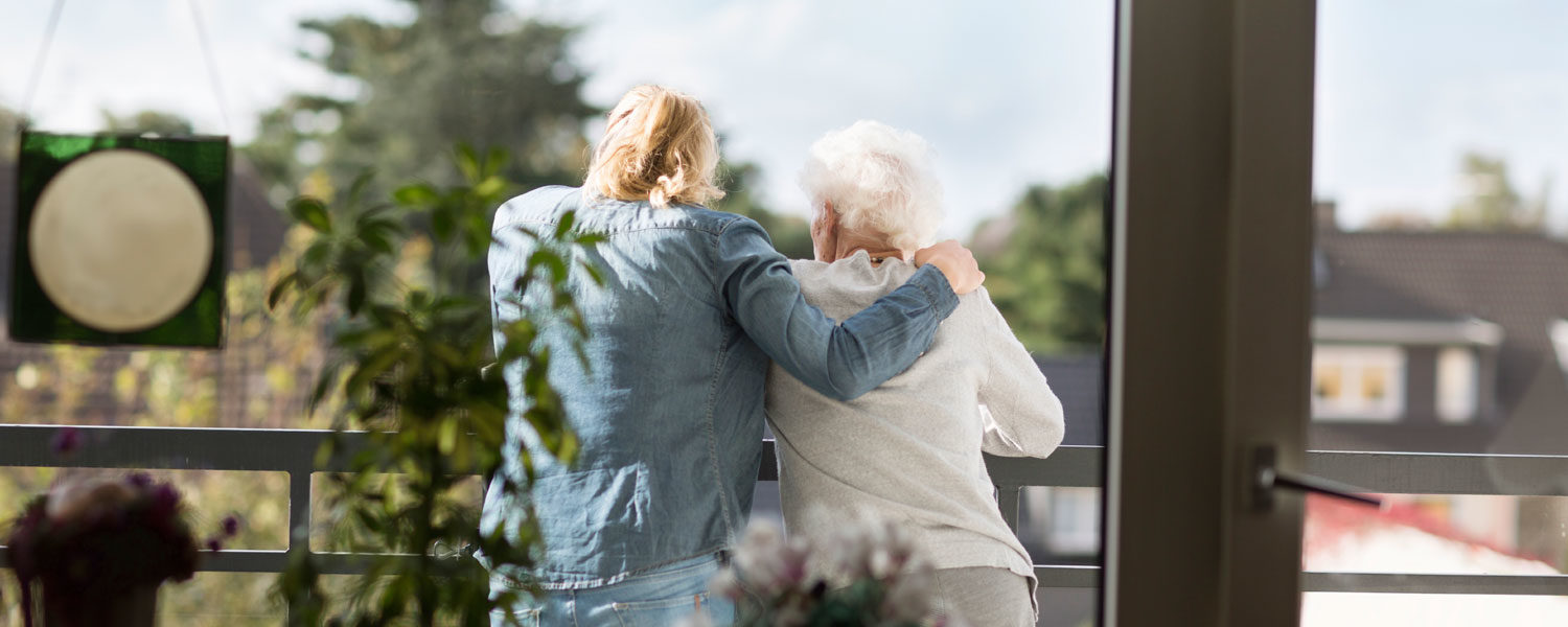 Mother wrapping her arm around mother